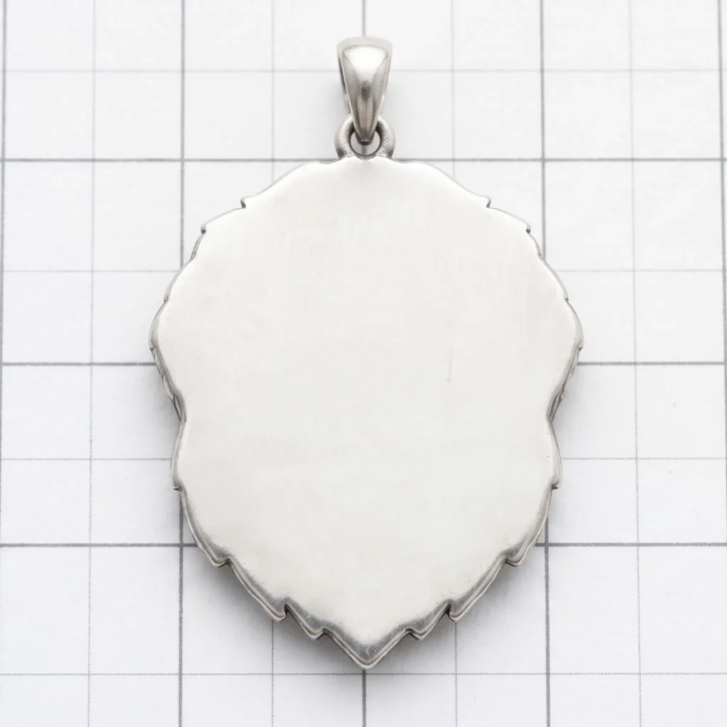 polished back of sterling silver custom pet portrait pendant ready for personalized engraving