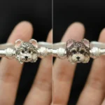 side by side comparison of silver and hand painted enamel dog portrait bangle bracelets