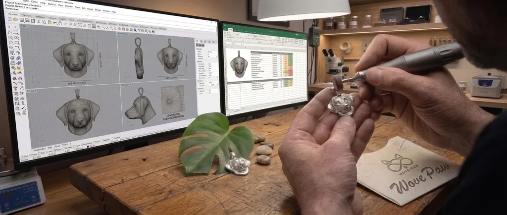 Our Story wove paw artisan crafting 925 sterling silver custom dog pendant at workbench with 3d modeling screens