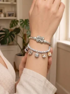 wove paw custom pet charm bracelet worn on wrist